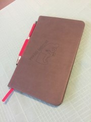 Clay Thompson Small Notepad with a red string attached